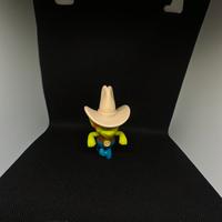 Personaggio giocattolo alieno cowboy
