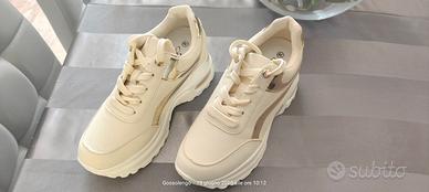 sneakers.scarpe da donna con plantare largo e alto