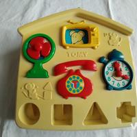 Giocattolo vintage Tomy a forma di casetta 