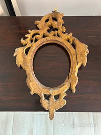 Antica cornice dorata in legno patinato