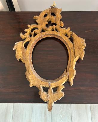 Antica cornice dorata in legno patinato