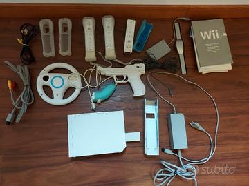 Wii completa di tanti giochi e accessori 