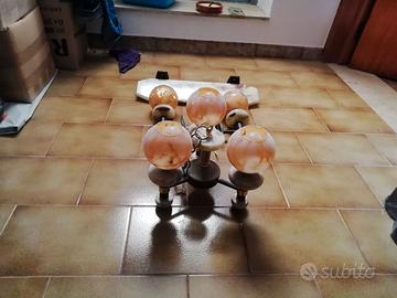 Mensola, lampadario e luci per specchio