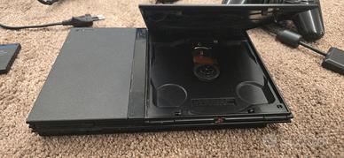 Ps2 slim + 2 controller originali + 28 giochi