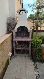 Barbecue e panche e sedie