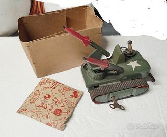 Giocattolo in latta carica a molla 