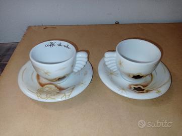 coppia di tazzine da caffè con piattini 