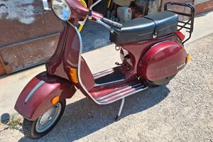 Vespa P200E America