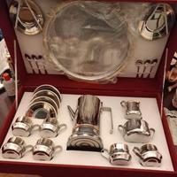 Servizio caffè in acciaio inox 18/X e oro zecchino