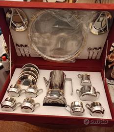 Servizio caffè in acciaio inox 18/X e oro zecchino