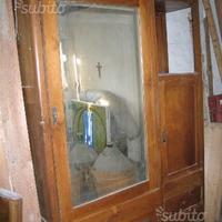 : Camera con armadio e letto in legno primi 900