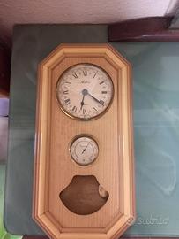 orologio a pendolo da muro