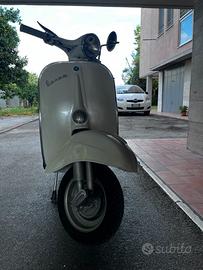 Vespa 50 special faro tondo