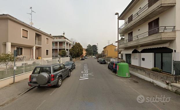 Tranquillo quadrilocale con giardino e box auto