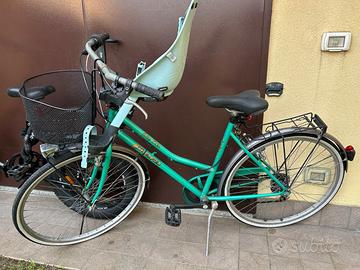 Bicicletta da donna con seggiolino