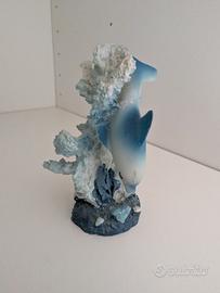 souvenir delfino con corallo