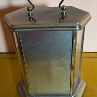 Orologio  con pendoli da tavolo