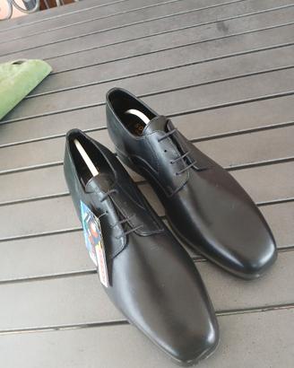 scarpa t 44 classica con etichetta eur50 marca sol