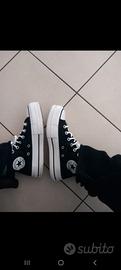 Converse nere