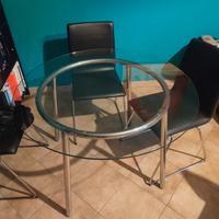 Tavolo tondo di vetro e 4 sedie