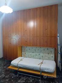 Armadio a ponte con letto