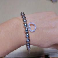 braccialetto in argento con charm