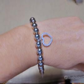 braccialetto in argento con charm