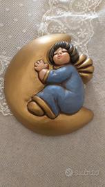 angelo che dorme sulla luna 