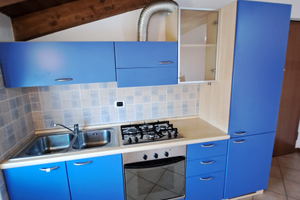 Monolocale mansardato arredato