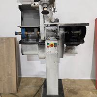 Macchina di finissaggio con impianto aspirazione