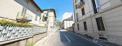 Stanza singola a Lecco arredata con balcone