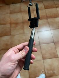 Reggi telefono telescopico