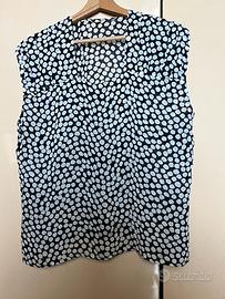 Blusa leggera blu a pois bianchi