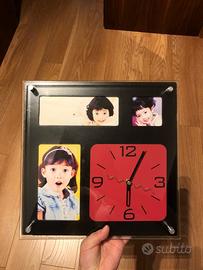 Cornice porta foto con orologio