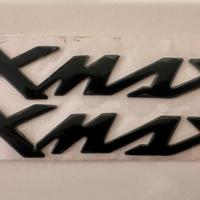 X Max logo originale