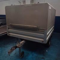 RIMORCHIO CON BOX CONTENITORE