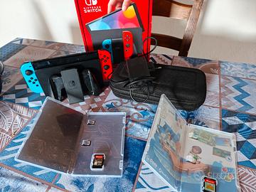 Nintendo switch OLED + Custodia + 2 giochi 