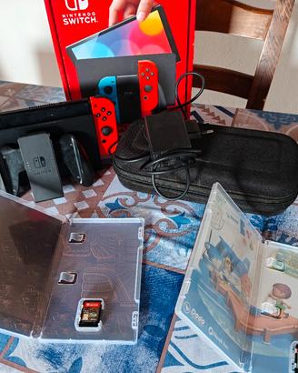 Nintendo switch OLED + Custodia + 2 giochi 