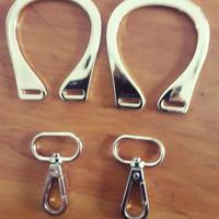 Accessori in acciaio dorato per borse 