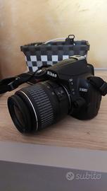 Nikon d3000 + obiettivo 50-200 sigma