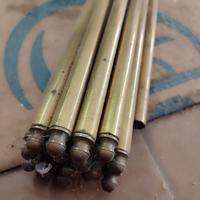 bacchette in ottone ferma tappeto