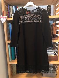 Vestito nero e cipria