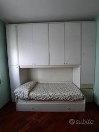 Camera da letto singola con armadio a ponte