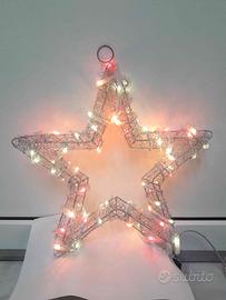 Stella Natale argentata in metallo