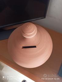  salvadanaio in terracotta. 