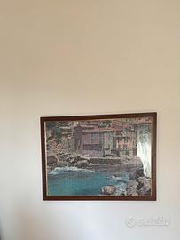 Quadro puzzle borgo sul mare incorniciato in legno