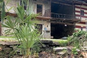 Porzione di rustico terratetto con terreno