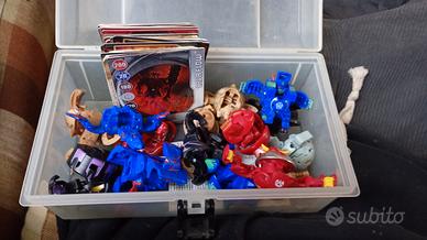 Lotto 16 Bakugan vari e carte magnetiche