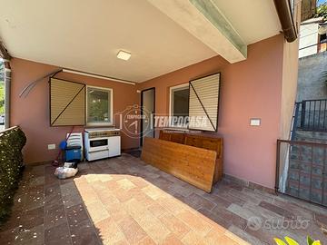 Trilocale con giardino e terrazzo