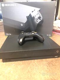 Xbox One X 1 TB + 6 Giochi + 2 Gamepad